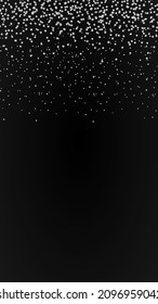 luxury blue glitter, falling shiny sequins with copy space for festive imvitation card.