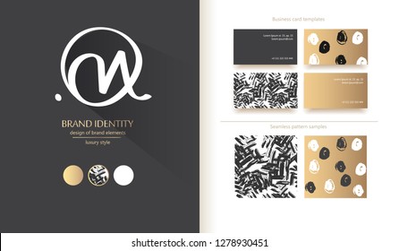 Luxury brand line logo with calligraphic uppercase O and lowercase m or n letters forming "Om". Classic style branding templates. Business cards and used seamless patterns included - Vector