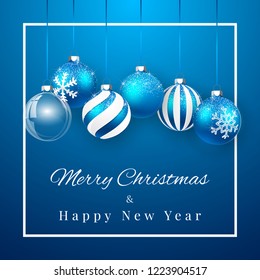 Luxury Christmas design with blue Christmas balls and Xmas glass ball over blue background. Holiday decoration template. Vector illustration.