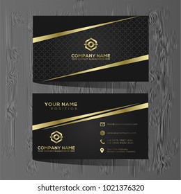 Luxury and elegant black gold business cards template on black background. 