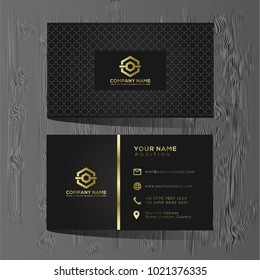 Luxury and elegant black gold business cards template on black background. 