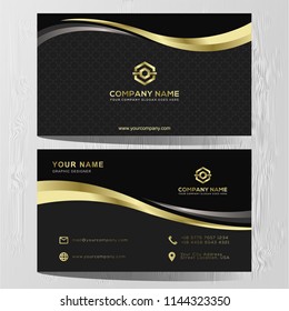 Luxury and elegant black gold business cards template on black background. 