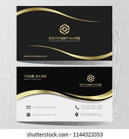 Luxury and elegant black gold business cards template on black background. 