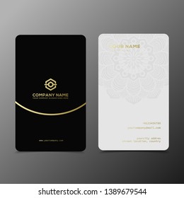 Luxury and elegant black gold business cards template on black background.