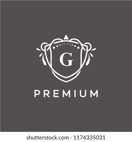 Luxury G Initial Logo frame symbol, Luxury and graceful floral monogram design dark background
