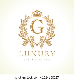 Luxury G letter and crown monogram logo. Laurel elegant beautiful round identity with crown and wreath. Vector letter emblem G for Antique, Restaurant, Cafe, Boutique, Hotel, Heraldic, Jewelry