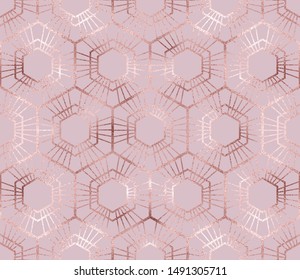 Luxury geometric seamless pattern with rose gold hexagon tiles.