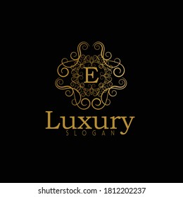 Luxury gold calligraphic vintage emblem with classy floral ornament. Luxury Badge E Letter Logo. Golden vintage vector logo frame design. Letter E monogram