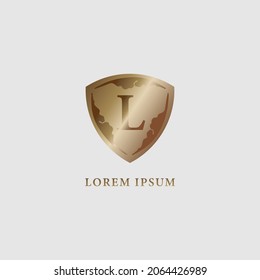 Luxury gold decorative shield sign illustration. Letter L alphabet logo design template. Security, protection logo concept. Initial abjad company logo isolated on light gray background