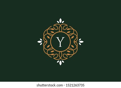 Luxury gold green logo design template vector illustration for Restaurant, Royalty, Boutique, Cafe, Hotel, Heraldic, Jewelry and Fashion. Ornament shapes for logotype or badge design.