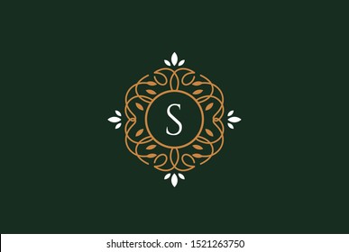 Luxury gold green logo design template vector illustration for Restaurant, Royalty, Boutique, Cafe, Hotel, Heraldic, Jewelry and Fashion. Ornament shapes for logotype or badge design.