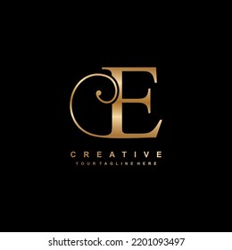 luxury gold letter E logo design. E flourish. E monogram logo, typography logo. beautiful letter E. suitable for business logo, company, beauty, boutique, wedding, etc