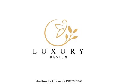 luxury gold logo butterfly perching on leaf or flower in simple flat design style