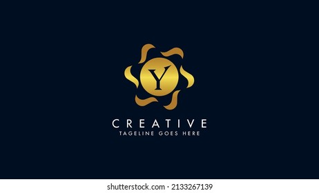 Luxury gold logo featuring a stylized letter "Y" within a golden circle, surrounded by wavy lines, Elegant vector monogram icon, Isolated on a dark background.