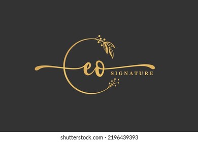 luxury gold signature initial E O logo design isolated leaf and flower