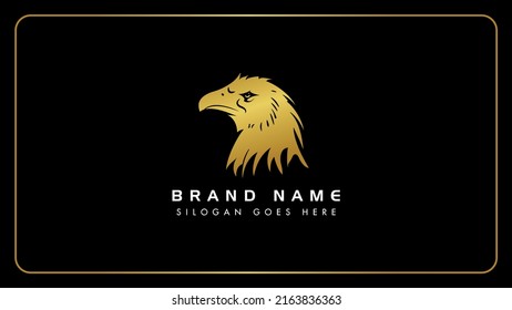 Luxury golden Eagle bird face logo design template, Creative gold color eagle bird head monogram icon, Eagle bird vector illustration art, Isolated on black background.