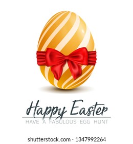 luxury golden easter egg with red bow