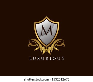 Luxury Golden Shield M Letter Logo. Vintage Shield With M Letter prefect for boutique, hotel, restaurant, wedding and other elegant business. 