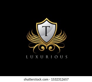 Luxury Golden Shield T Letter Logo. Vintage Shield With T Letter prefect for boutique, hotel, restaurant, wedding and other elegant business. 