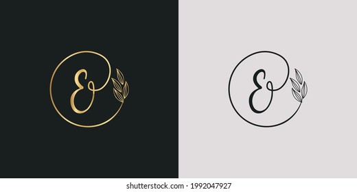 luxury golden signature letter E isolated circle with leaves ahead. vector monogram for cosmetic, restaurant, boutique, hotel , nature logo concept vector