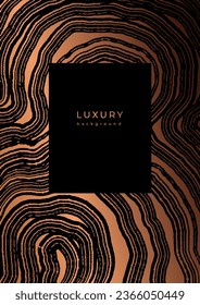 Luxury golden template with wood rings texture. Banner with tree slice pattern. Stamp of tree trunk in section. Wooden concentric circles. Black and bronze marble background