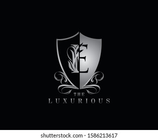 Luxury Guard E Letter Logo Icon. Silver E With Classy Shield Shape design perfect for fashion, Jewelry, Beauty Salon, Cosmetics, Spa, Hotel and Restaurant Logo. 