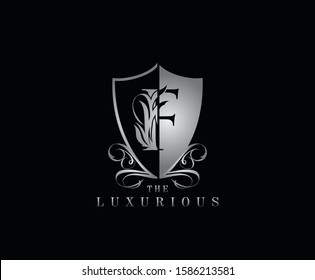 Luxury Guard F Letter Logo Icon. Silver F With Classy Shield Shape design perfect for fashion, Jewelry, Beauty Salon, Cosmetics, Spa, Hotel and Restaurant Logo. 