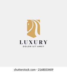 Luxury horse shield logo formed with simple and modern shape in gold color
