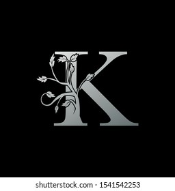 Luxury Initial Letter K logo icon. Creative vector logo icon design concept  nature floral tree ornament with letter K silver color for business or company identity. 