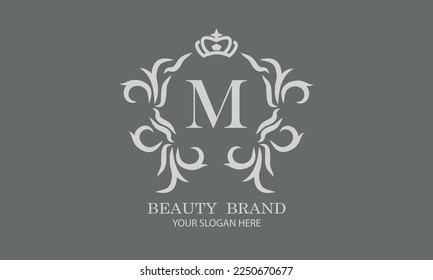 Luxury initial M logo template for restaurant, royalty, boutique, cafe, hotel, heraldic, jewelry, fashion and other vector illustrations