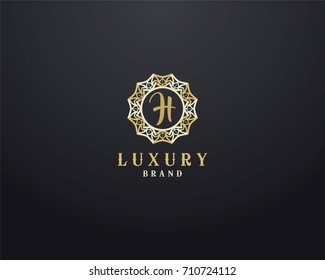 Luxury letter H monogram vector logo design. mandala and ornamental logo.