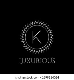 Luxury letter K Circle Logo vector design  silver color.