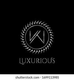 Luxury letter W Circle Logo vector design  silver color.