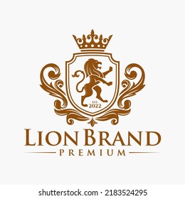 Luxury Lion crest heraldry logo. Elegant gold heraldic shield icon. Premium brand identity emblem. Royal coat of arms company label symbol. Modern vector illustration.