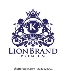 Luxury Lion Crest Heraldry Logo. Elegant Gold Heraldic Shield Icon. Premium Brand Identity Emblem. Royal Coat Of Arms Company Label Symbol. Modern Vector Illustration.