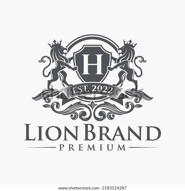 Luxury Lion crest\
heraldry logo. Elegant gold heraldic shield icon. Premium brand\
identity emblem. Royal coat of arms company label symbol. Modern\
vector illustration.