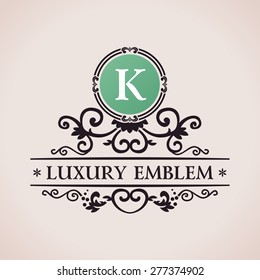 Luxury logo. Calligraphic pattern elegant decor elements. Vintage vector ornament K