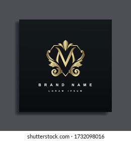 Luxury Logo Design with monogram letter M ,golden color, luxury flourish decorative style, vector illustration.