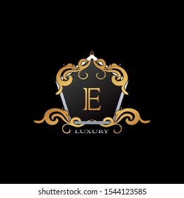 Luxury Logo Letter E. Elegant logo design concept letter E on hexagon geomtric frame with floral element for boutique, hotel, fashion and more brands.