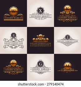 Luxury logo set. Calligraphic pattern elegant decor elements. Vintage vector gold ornament Signs and Symbols