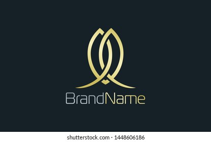 Luxury logo with two interconnected leaves in gold color