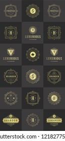 Luxury logos templates set, flourishes calligraphic elegant ornament lines. Business sign, badges and monograms for elegant crest, boutique brand, royal restaurant, hotel sign, fashion designer.