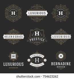 Luxury logos templates set, flourishes calligraphic elegant ornament lines. Business sign, badges and monograms for elegant crest, boutique brand, wedding shop, hotel sign, fashion designer.