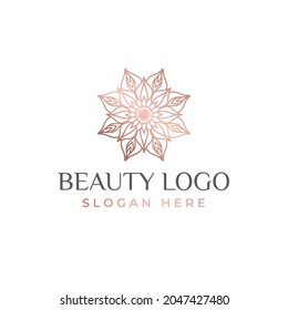 Logotipo de lujo en forma de flor para una tienda de antigüedades. Logo de oro, flor. Simple señal geométrica. Iconos, negocios, invitaciones. Gran brote dorado volumétrico. Vintage.