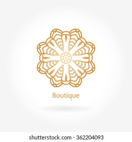 Luxury logotype in the shape of a flower for antique boutique. Gold logo, flower. Simple geometric sign. Icons, business, invitations. Volumetric golden big bud. Vintage. Islam, Arabic, Indian. Retro.