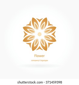 Luxury logotype in the shape of a flower for antique boutique. Gold logo, flower. Simple geometric sign. Icons, business, invitations. Volumetric golden big bud. Vintage. Islam, Arabic, Indian. Retro.
