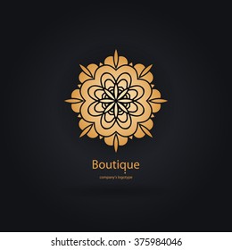 Luxury logotype in the shape of a flower for antique boutique. Gold logo, flower. Simple geometric sign. Icons, business, invitations. Volumetric golden big bud. Vintage. Islam, Arabic, Indian. Retro.