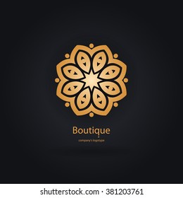 Luxury logotype in the shape of a flower for antique boutique. Gold logo, flower. Simple geometric sign. Icons, business, invitations. Volumetric golden big bud. Vintage. Islam, Arabic, Indian. Retro.