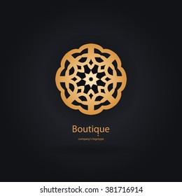 Luxury logotype in the shape of a flower for antique boutique. Gold logo, flower. Simple geometric sign. Icons, business, invitations. Volumetric golden big bud. Vintage. Islam, Arabic, Indian. Retro.