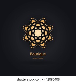 Luxury logotype in the shape of a flower for antique boutique. Gold logo, flower. Simple geometric sign. Icons, business, invitations. Volumetric golden big bud. Vintage. Islam, Arabic, Indian. 